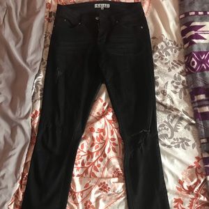 Black Jeans with star design and one rip